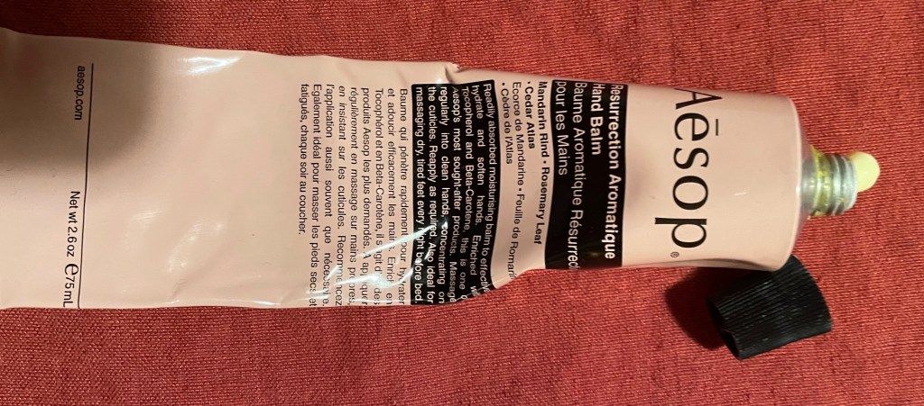 Photo of open tube of Aesop Resurrection Aromatique Hand Balm.